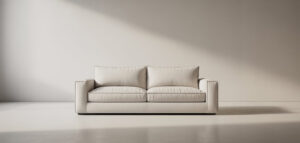 En fotorealistisk bild av en ren, ljus tygsoffa i ett minimalistiskt vardagsrum.