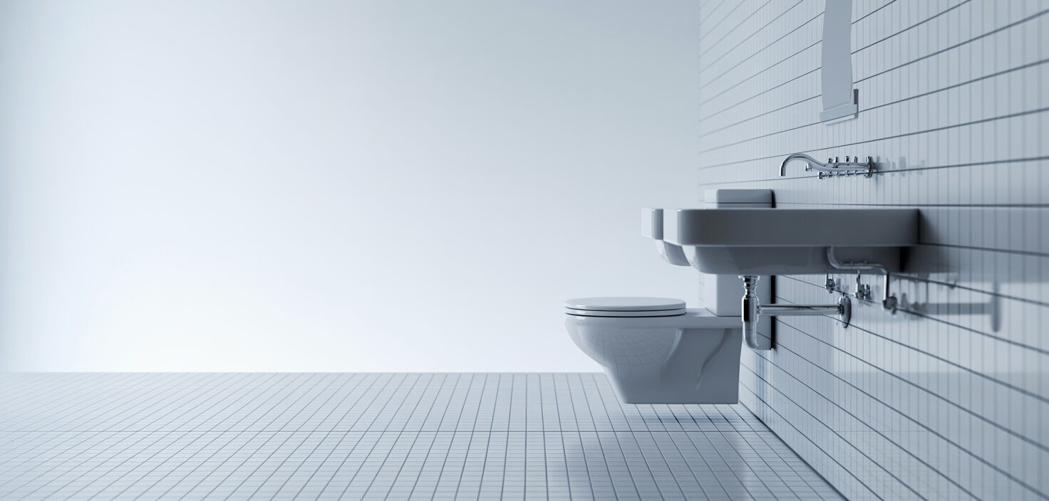 Ett fotorealistiskt foto av ett skinande rent badrum med vita kakel, minimalistisk design och inget rörigt.