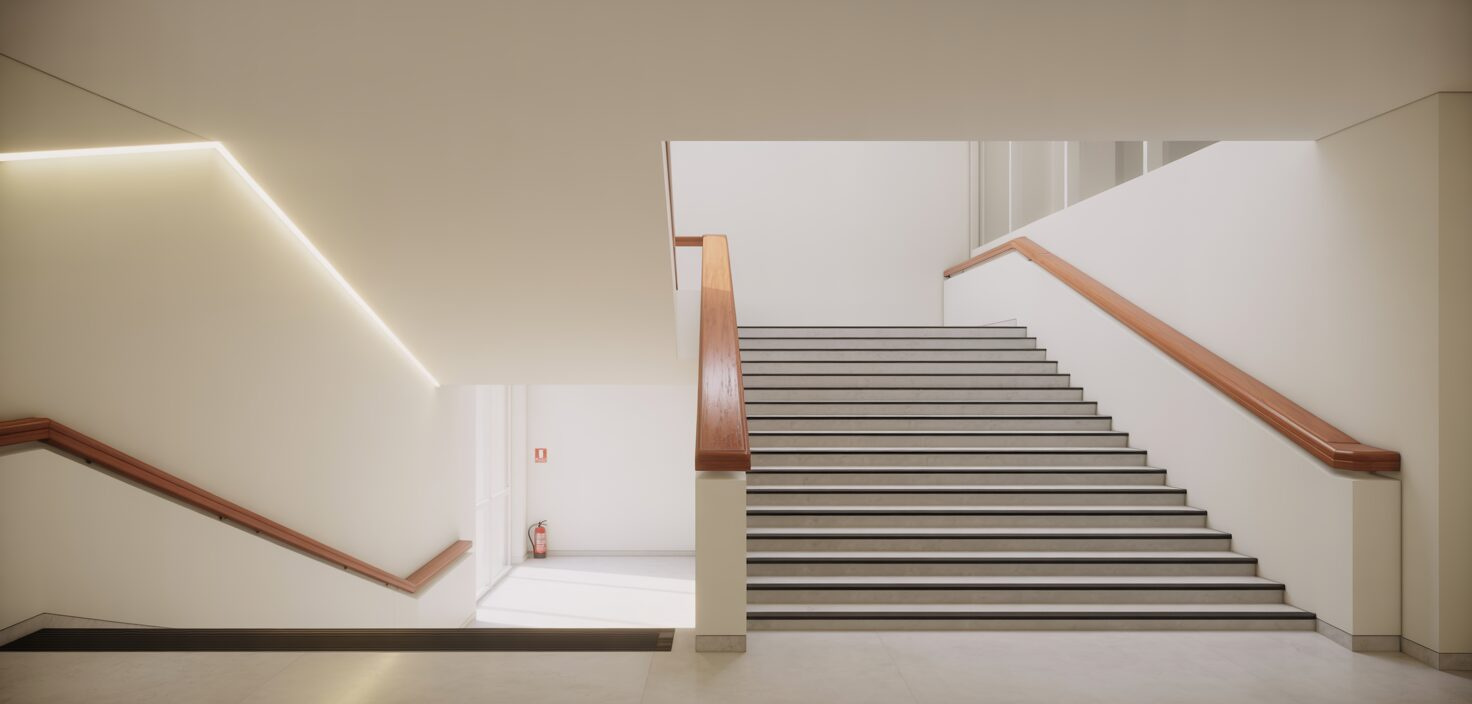 Ett rent och ljust trapphus med minimalistisk design och fokus på säkerhet.